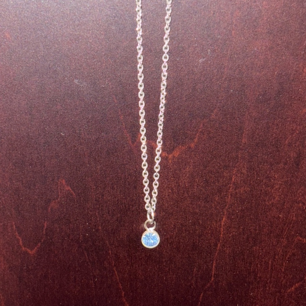 Elegant Silver Necklace with Blue Pendant